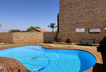 A perfect 2 bed 1 bath townhouse has rooms with a private hot tub