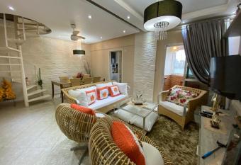 Apartamento em frente ao mar has Balcony rooms