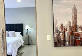 Apartaestudio-proximo al aeropuerto has Balcony rooms