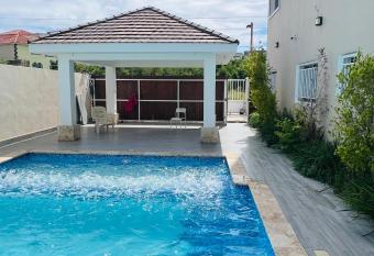 Ambar Luxurious Condo At Caleta allows 18 year olds to book a room