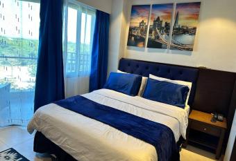 Studio Deluxe Tambuli Seaside Tower C CebuPh Seaview 15mins to airport has Balcony rooms