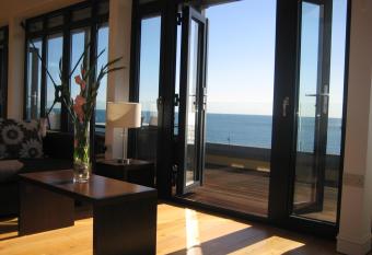  Riviera Apartments  Beachfront Penthouse Apartments with Wrap-Around Balconies and Panoramic Sea Views allows 18 year olds to book a room