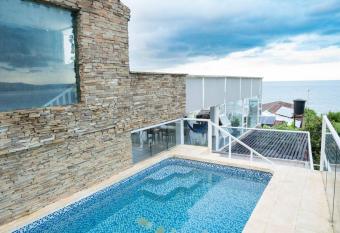 Amazing beach house with pool has Balcony rooms