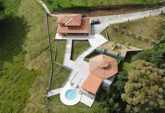 villa santuario has rooms with a private hot tub