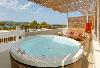 The Signature Level at TRS Ibiza Hotel All Inclusive Adults Only has rooms with a private hot tub