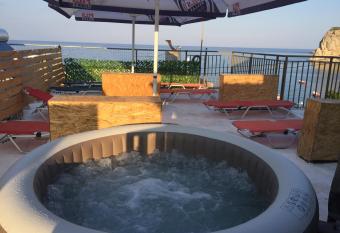 Anastasia Studios, Apartments & Suites has rooms with a private hot tub