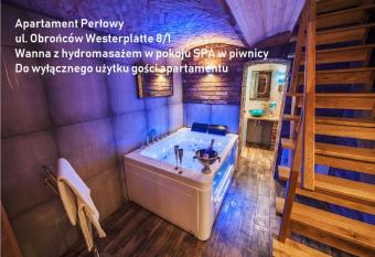 Sopot Spa Apartament has rooms with a private hot tub