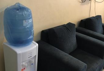 Aljazeera Hotel Apartments has rooms with a private hot tub