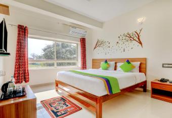 Treebo Trend Atithi Comforts 1 Km From Nisargadhama Forest allows 18 year olds to book a room