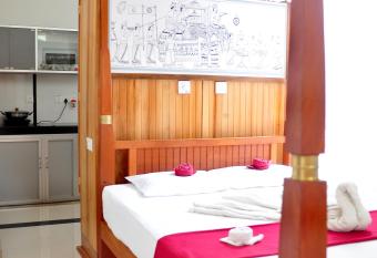 Surewo Apartment has rooms with a private hot tub