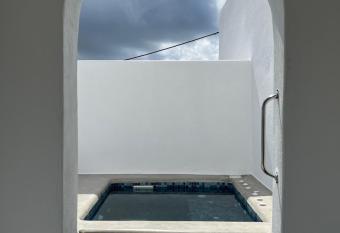 Pancratium Villas & Suites has rooms with a private hot tub