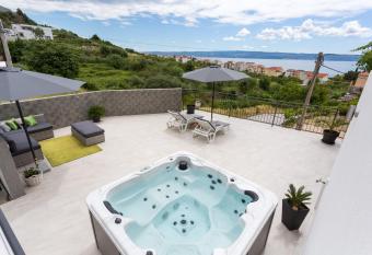 Apartments Lidija - sea view with private hot tub and split level apartment with private pool has Balcony rooms