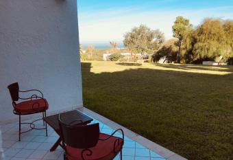 Golden Carthage Residences has rooms with a private hot tub