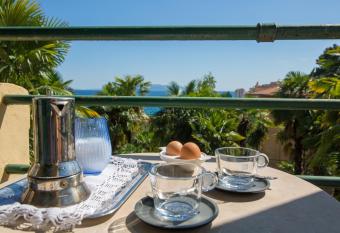 Piano Nobile & Penthouse in Villa Near Beach has Balcony rooms