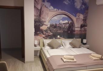 Sun Apartments has rooms with a private hot tub