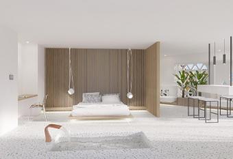 Mykonos Dove Beachfront Hotel has rooms with a private hot tub