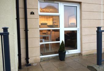 Deluxe Seaside Apartment Ground Floor with Private Entrance and Patio allows 18 year olds to book a room