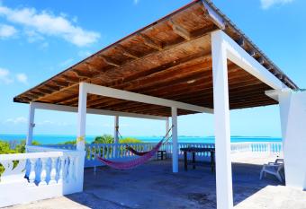 SEE BELIZE VACATION RENTALS - SUNROOM Sea View Suite with Infinity Pool, Overwater Deck & Roof Terrace has Balcony rooms