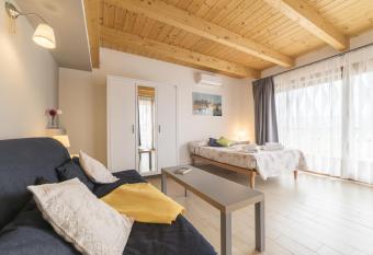 Peperino Attic Flat has Balcony rooms