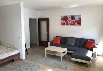 TMJ Apartment 1 has rooms with a private hot tub