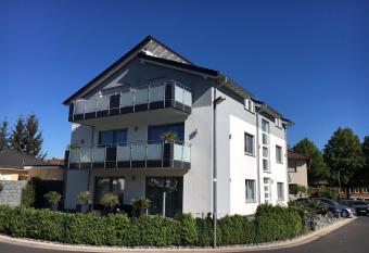 Moderne Neubau Ferienwohnung has Balcony rooms