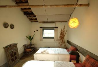 Yellow And Black Guest House has Balcony rooms