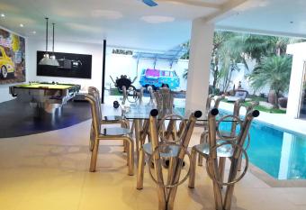 Gallery pool villa has rooms with a private hot tub