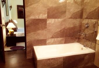 The Buddhayan Villa has rooms with a private hot tub