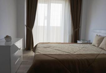 Funky Shell Apartment has Balcony rooms