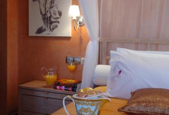 Olympic Fashion Hotels has rooms with a private hot tub