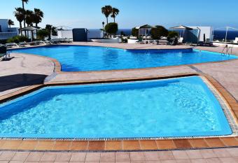 Puerto del Carmen center - New Apartment by the pool and private parking has Balcony rooms