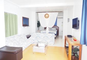 Holiday Homes TSUBOYA 2nd has rooms with a private hot tub