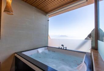 Hotel Mystic Mountain has rooms with a private hot tub