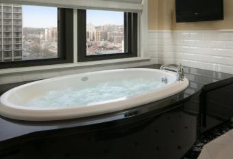 The Raphael Hotel Autograph Collection has rooms with a private hot tub
