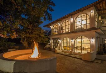 StayVista s Casa Blanca - Modern elegance with a pool, spacious lawn & diverse activities allows 18 year olds to book a room