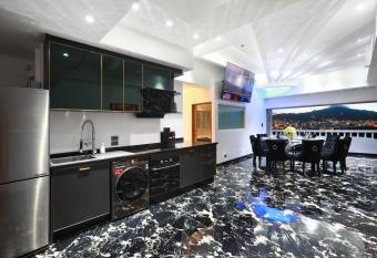 PATONG TOWER DESIGNER APARTMENTS by PTA has rooms with a private hot tub