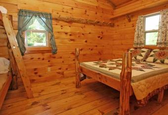 Robin Hill Camping Resort Deluxe Cottage 13 allows 18 year olds to book a room