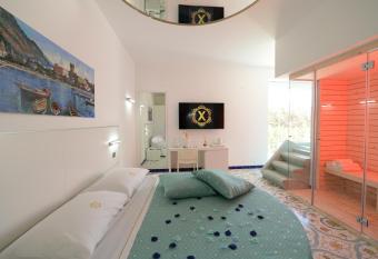 X Hotel has rooms with a private hot tub