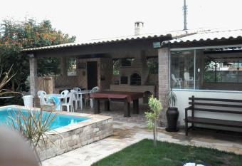 Recanto Su  tes has rooms with a private hot tub