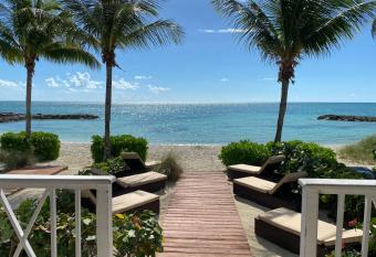 Palm Cay Luxury Design Townhome On Private Beach allows 18 year olds to book a room