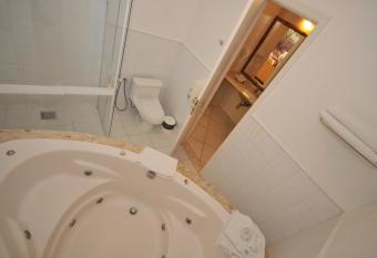 Rio B  zios Beach Hotel has rooms with a private hot tub