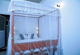 Coconut Style Restaurant & Milinda Guest has Balcony rooms