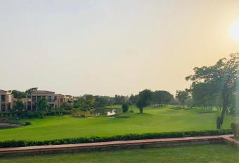 Beautiful Apartments at Tarudhan Valley Golf Resort, Manesar has rooms with a private hot tub