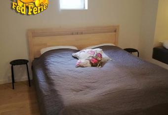 S  huset has rooms with a private hot tub