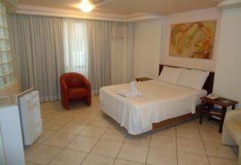 Hotel Minuano has rooms with a private hot tub