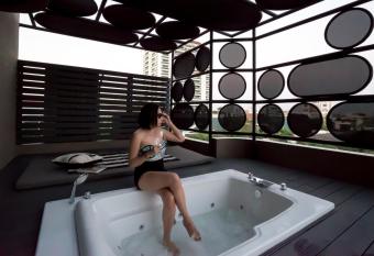 THEA Serviced Apartment by TH District has rooms with a private hot tub