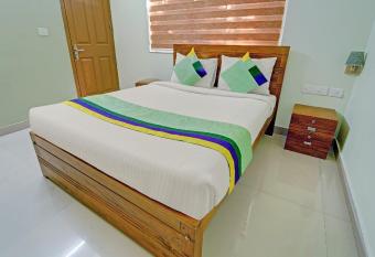 Treebo Trend Sreepathi Nirmalyam 1 Km From Guruvayoor Railway Station allows 18 year olds to book a room