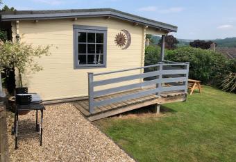 Morlais Log Cabin has Balcony rooms