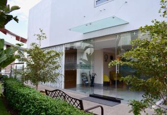 Country Hotel & Suites has rooms with a private hot tub