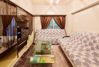 Holiday Homes TSUBOYA 202 has rooms with a private hot tub